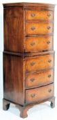 An early 20th century tallboy mahogany bow front chest on chest of drawers. The upright body