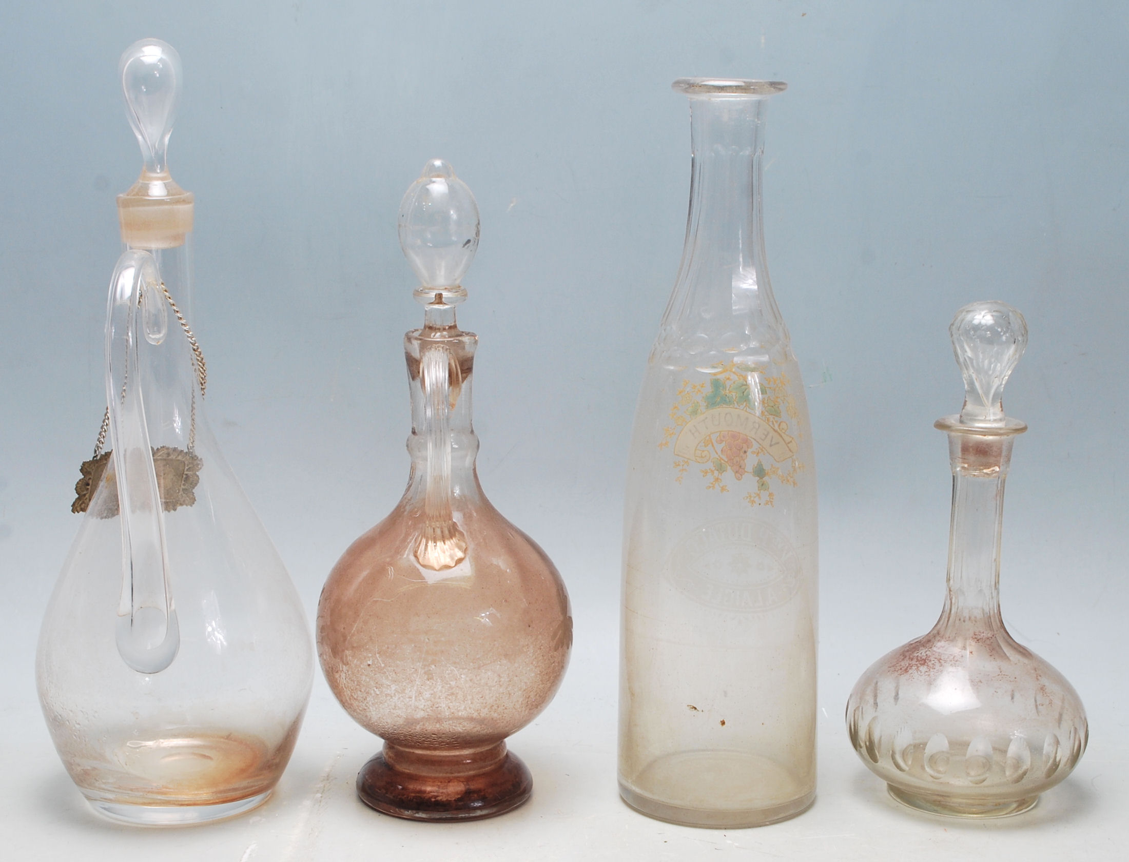 A collection of 18th century and 19th century Victorian glass decanters to include a two jug - Image 3 of 5