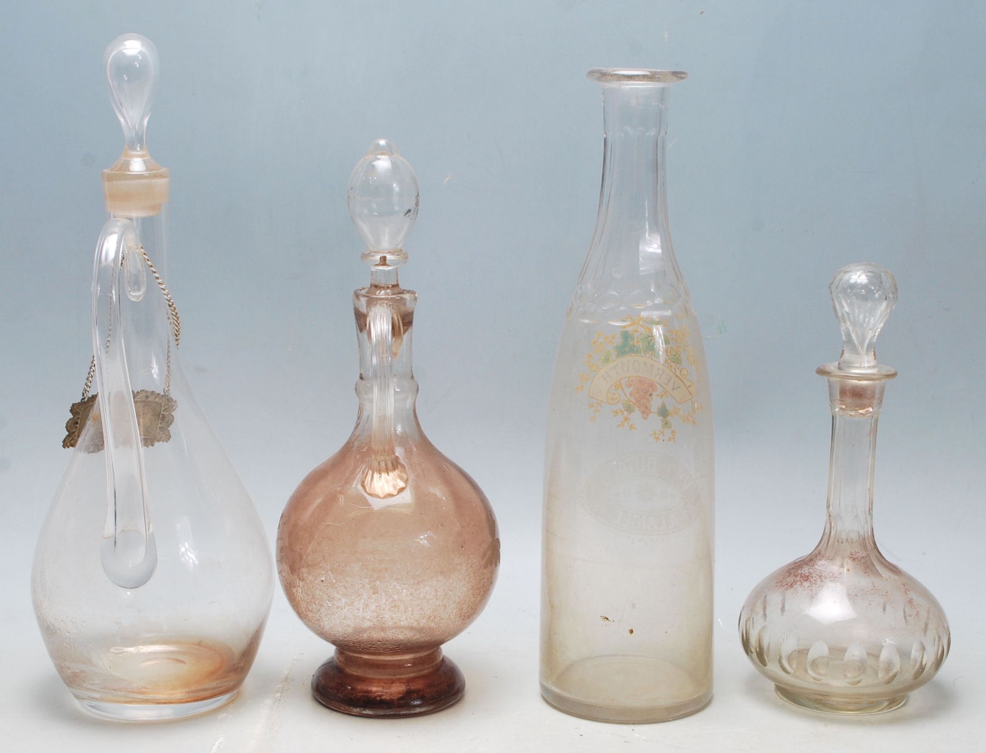 A collection of 18th century and 19th century Victorian glass decanters to include a two jug - Image 3 of 5