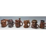A group of six Australian Bendigo studio art ceramic pottery limited edition character mugs to