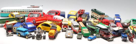 A large collection of 20th century vintage retro diecast toy cars to include matchbox cars, buses,