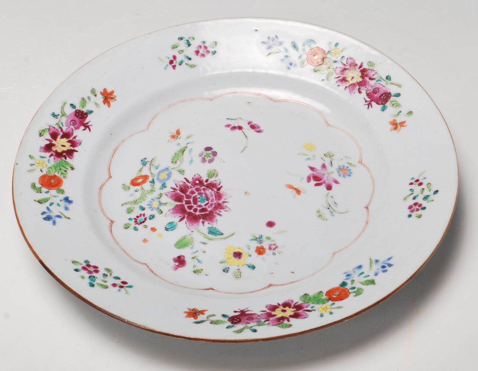 A 18th century Chinese Qianlong antique porcelain plate, decorated in the Wucai five colour