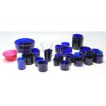 A good collection of 19th Century and later blue glass liners for condiments pots, to include