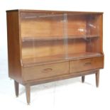 Jentique Furniture. A vintage retro 20th Century teak wood display cabinet / bookcase having a