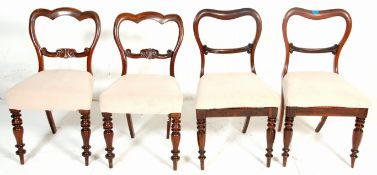 A harlequin set of four Victorian 19th century rosewood dining chairs having white fabric