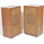 A pair of retro vintage teak wood cased Mordaunt Short Stirling speakers. Measures 73cm high.