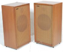 A pair of retro vintage teak wood cased Mordaunt Short Stirling speakers. Measures 73cm high.