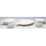 A set of vintage retro Shorter & Son fish plates having a white ground, includes a large plate,