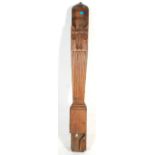 A substantial 20th Century wooden Totem pole / post of reeded and carved form featuring fleur de lis