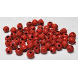 A good quantity of 20th century large red coral necklace beads each with drilled centres.
