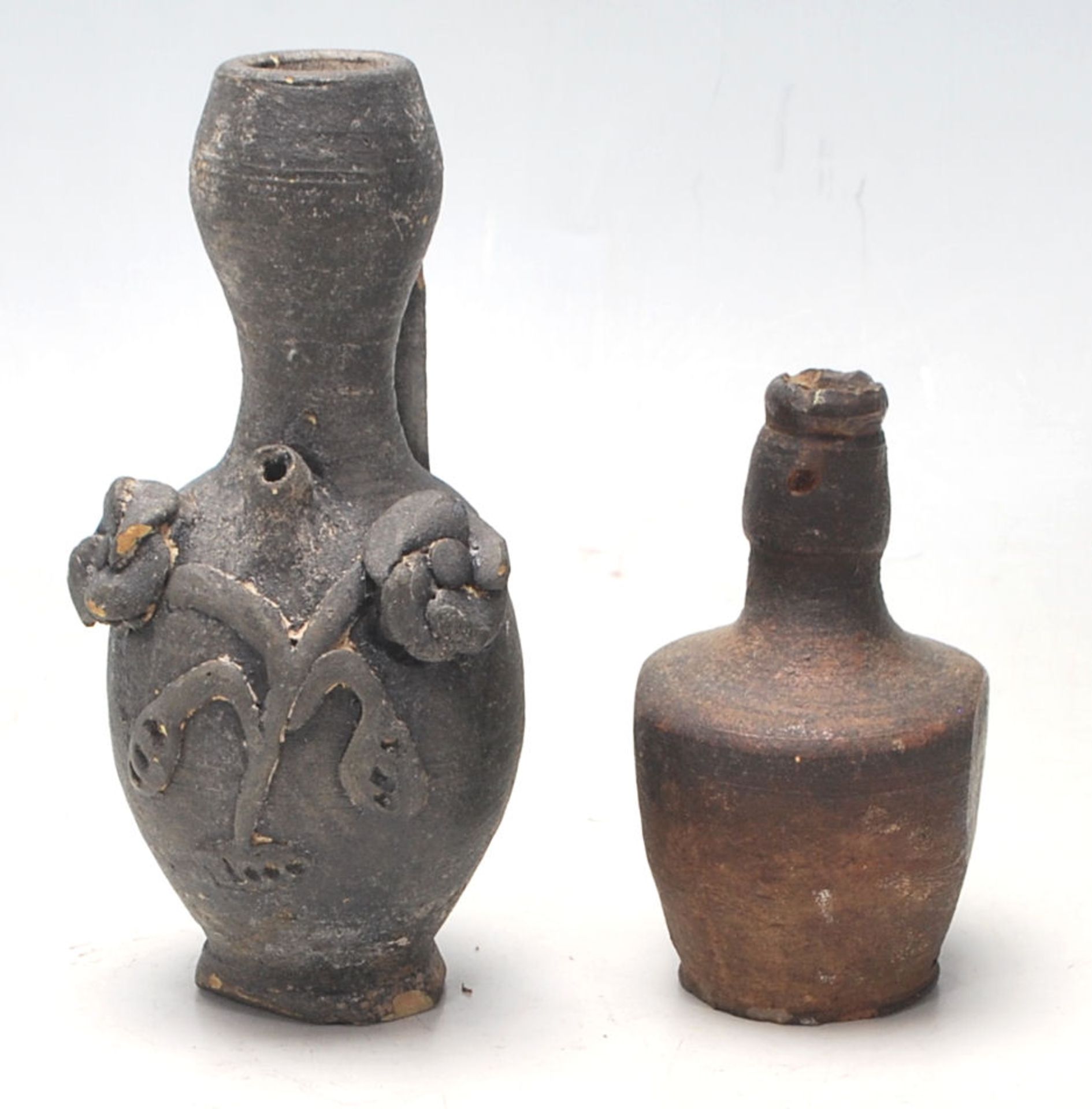 Two antique 16th Century style stoneware hand modelled jugs to to include an oil jug with applied - Image 2 of 7