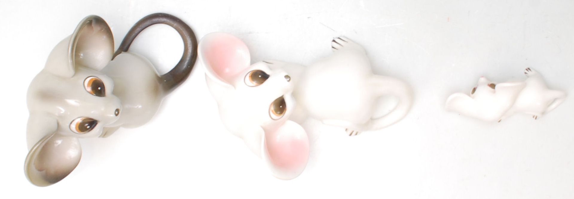 A group of 1960’s vintage German ceramic mice comprising of a pair of white and pink mice sitting on - Image 6 of 9