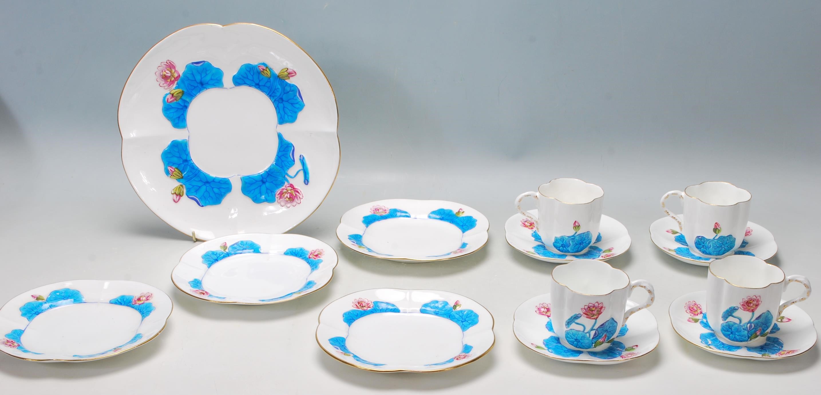 A 19th Century Victorian Coalport china tea set comprising of four trios and one cake plate with