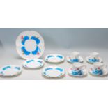 A 19th Century Victorian Coalport china tea set comprising of four trios and one cake plate with