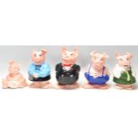 A set of five vintage Wade made NatWest bank advertising / savings / money box pigs. Unboxed, but