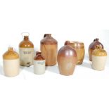 An excellent collection of 19th and 20th century stoneware flagons, barrels and jugs to include