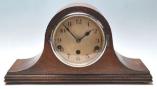 An mid century 1950's Napoleon's hat / dome top mantel clock with a 5 bell striking mechanism having