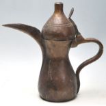 AN 18TH CENTURY PERSIAN, MIDDLE EAST ISLAMIC COFFEE POT
