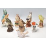 A collection of 20th Century ceramic birds to include Italian bisque examples, a Kingfisher