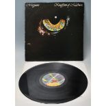 A vinyl long play LP record album by Magnum – Kingdom Of Madness – Original Jet Records U.K. Press –