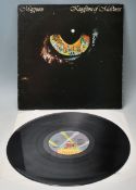 A vinyl long play LP record album by Magnum – Kingdom Of Madness – Original Jet Records U.K. Press –