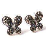A pair of silver and marcasite earrings in the form of butterflies. 15mm wide. Weighs 4g.