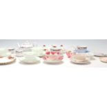 A collection of part china tea sets and cup and sauces to include Royal Albert Country Roses,