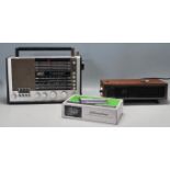 A mixed group of music of music players to include a Blaupunkt Supernova portable radio, a boxed