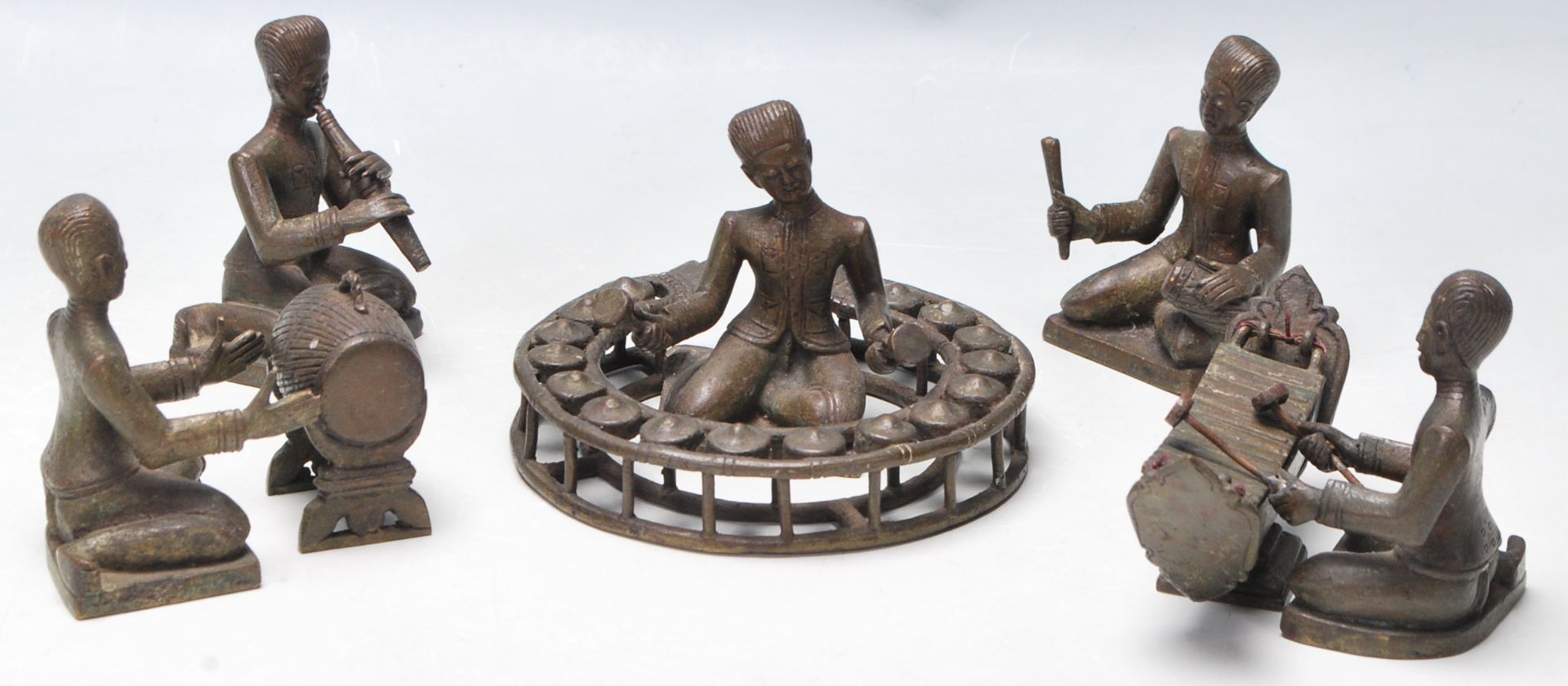 A set of five 19th century Indonesian / Javanese bronze Gamelan figurines featuring musicians
