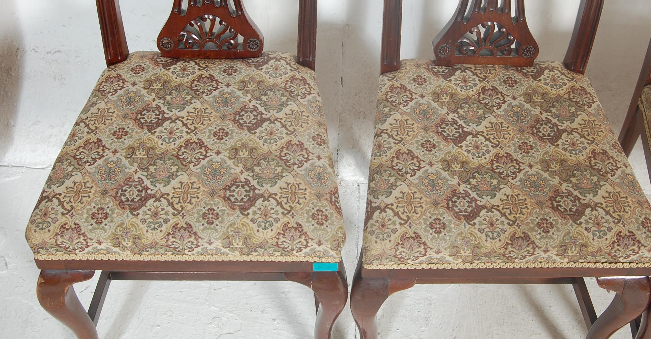 A set of four early 20th Century Edwardian dining chairs in the manner of hepplewhite having pierced - Image 4 of 5