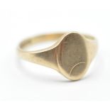 A hallmarked 9ct gold signet ring having an oval panel to the head. Hallmarked Birmingham 1959.
