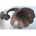A vintage 1930's Art Deco gramophone horn Amplion Loudspeaker having a panelled mahogany horn with