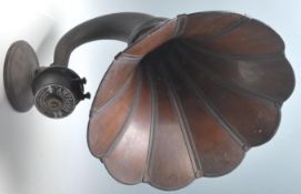 A vintage 1930's Art Deco gramophone horn Amplion Loudspeaker having a panelled mahogany horn with