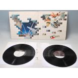 A vinyl long play LP record album by Pink Floyd – The Wall – Original Columbia Records U.S. Press –