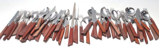 A large quantity of stainless steel Sheffield England cutlery to include knives, forks, spoons,