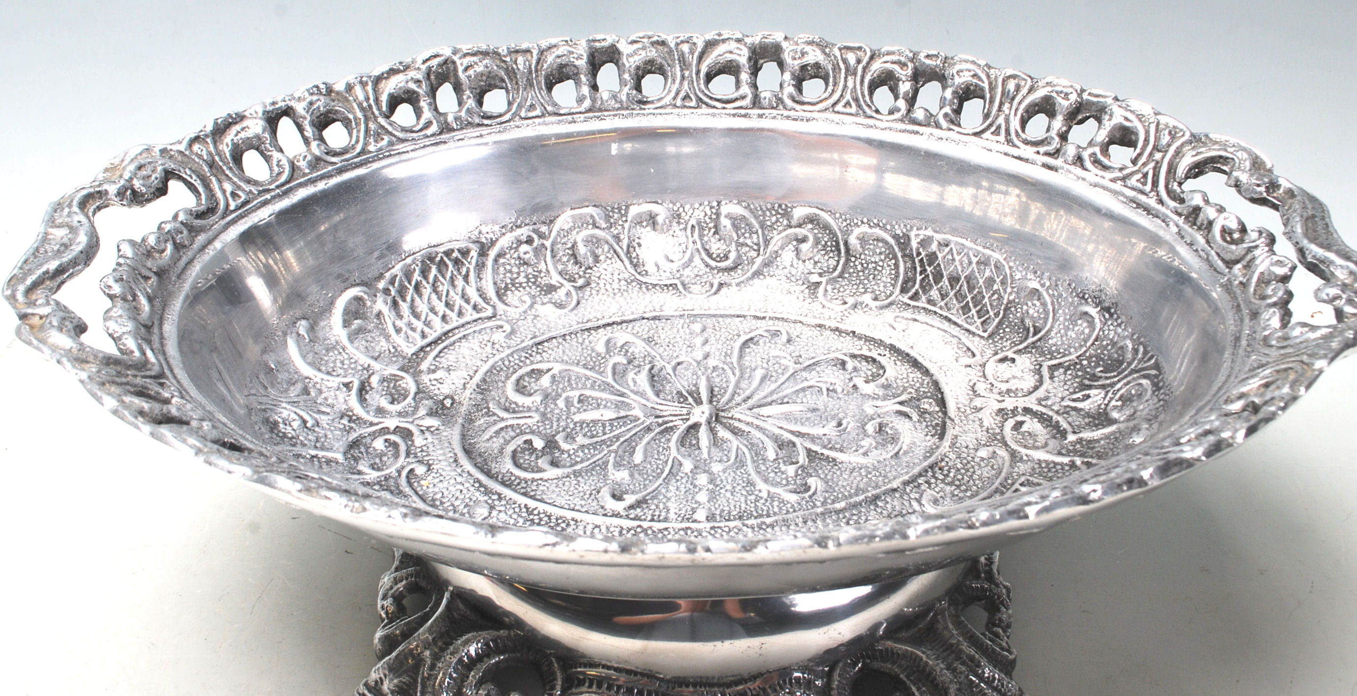 A 20th century Edwardian large silver plated fruit bowl / central piece of oval form with reposed - Image 2 of 5