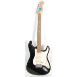 A vintage 90s Squier Strat by Fender Affinity Series Stratocaster electric guitar instrument
