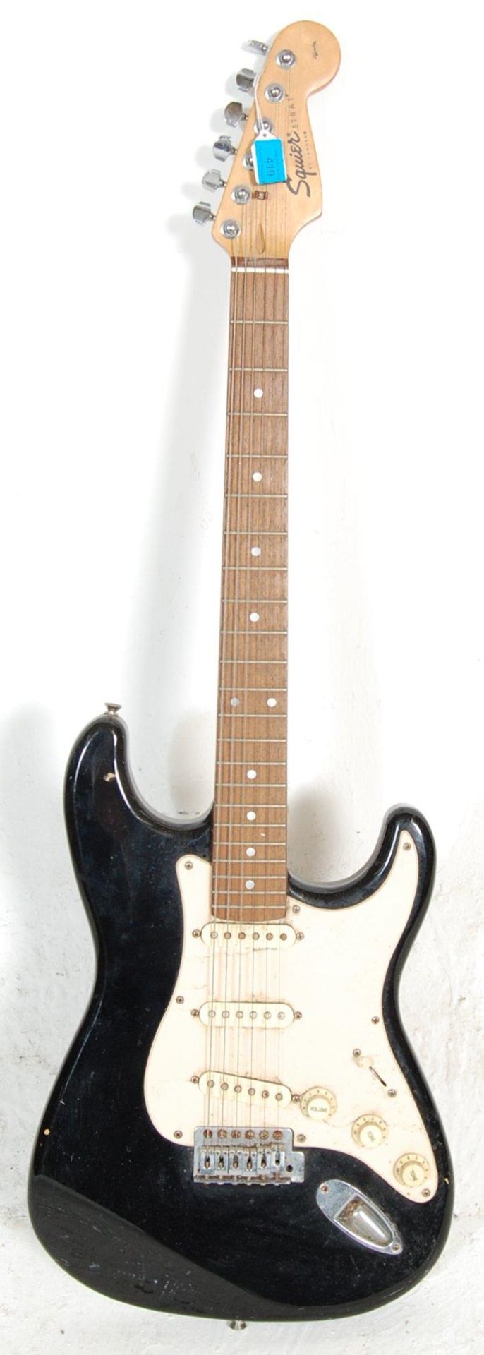 A vintage 90s Squier Strat by Fender Affinity Series Stratocaster electric guitar instrument