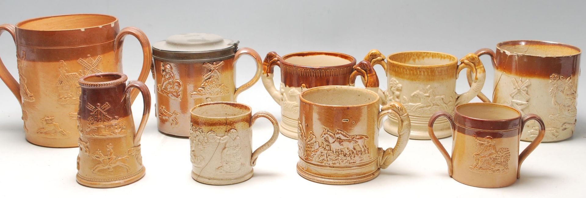 A large quantity of 19th century Royal Doulton Lambeth stoneware to include cups, jugs and loving