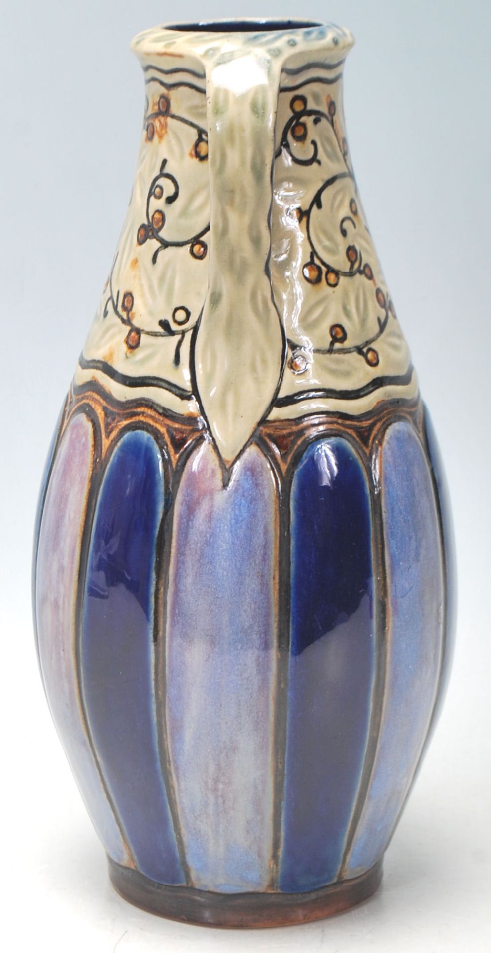 An early 20th Century Royal Doulton Lambeth stoneware large mantel vase in tapered form having - Image 4 of 7