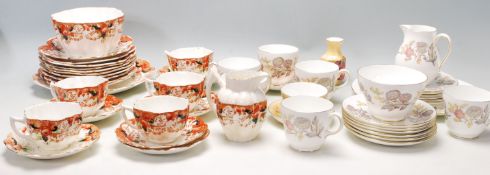 A collection of antique fine bone china tea sets to include a quantity of wedgwood cups and