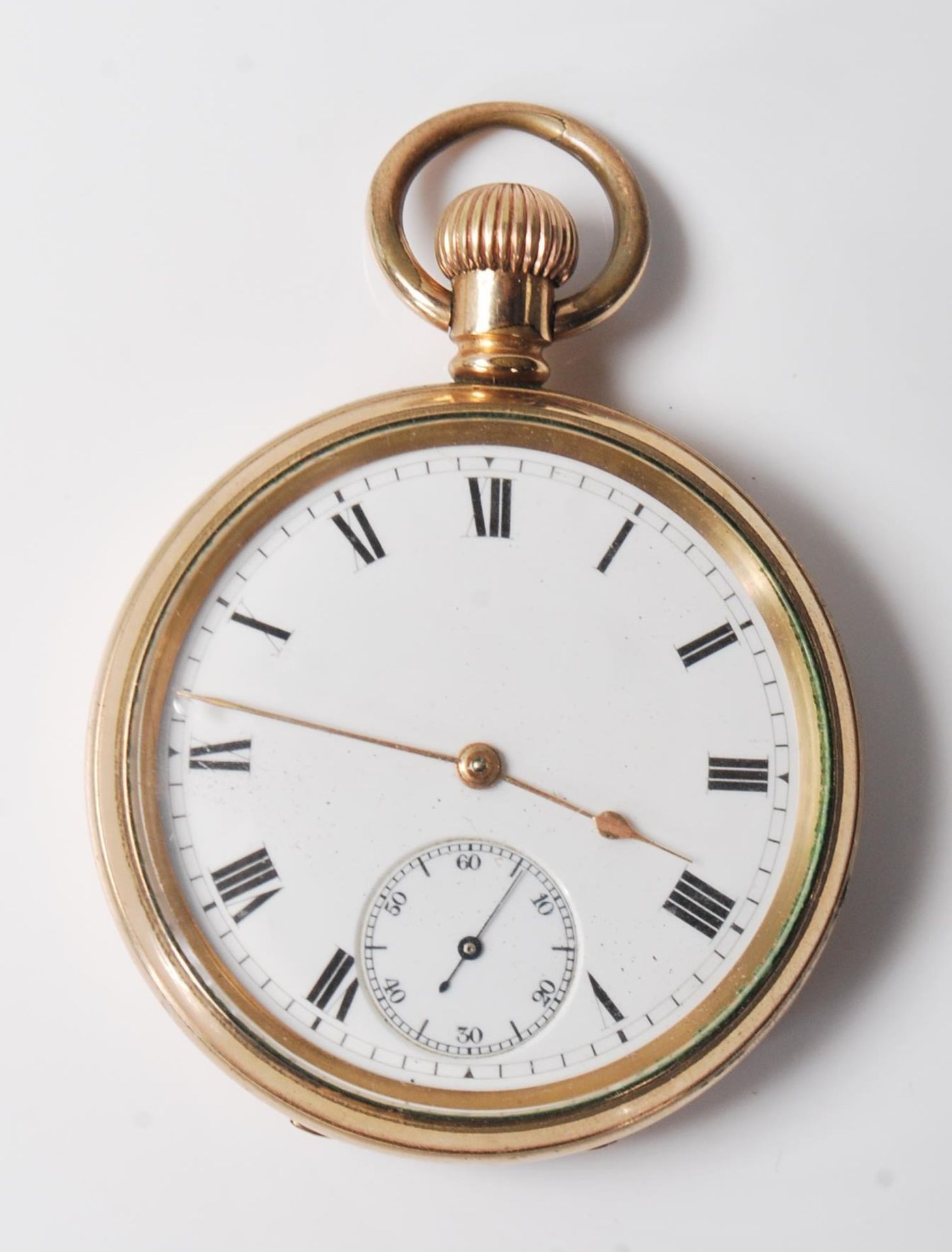 A 20th Century gold plated open face pocket watch having a white enamelled dial with roman