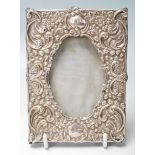 AN early 20th century silver hallmarked photo frame with foliate swags decorations. Hallmarks for