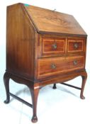 An Edwardian mahogany inlaid fall front bureau writing desk. The bureau with a fall front desk