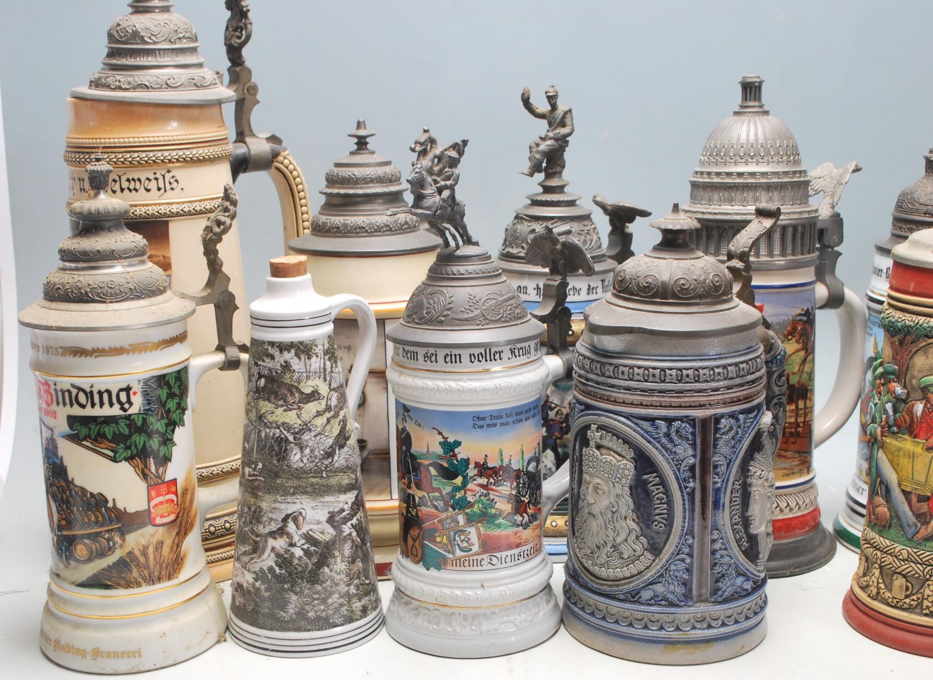 A collection of 20th Century German ceramic stein drinking glasses, each having raised polychrome - Bild 3 aus 7