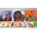 A group of reggae vinyl long LP record albums to include Steel Pulse True Democracy, Bob Marley &