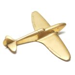 A WWII hand made trench art brass model Spitfire plane. Measures 12.5 x 15cm. Of military interest.
