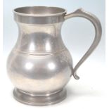 A large 20th Century Crown and Rose London one gallon pewter vessels in bulbous form with makers