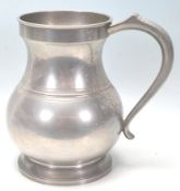 A large 20th Century Crown and Rose London one gallon pewter vessels in bulbous form with makers