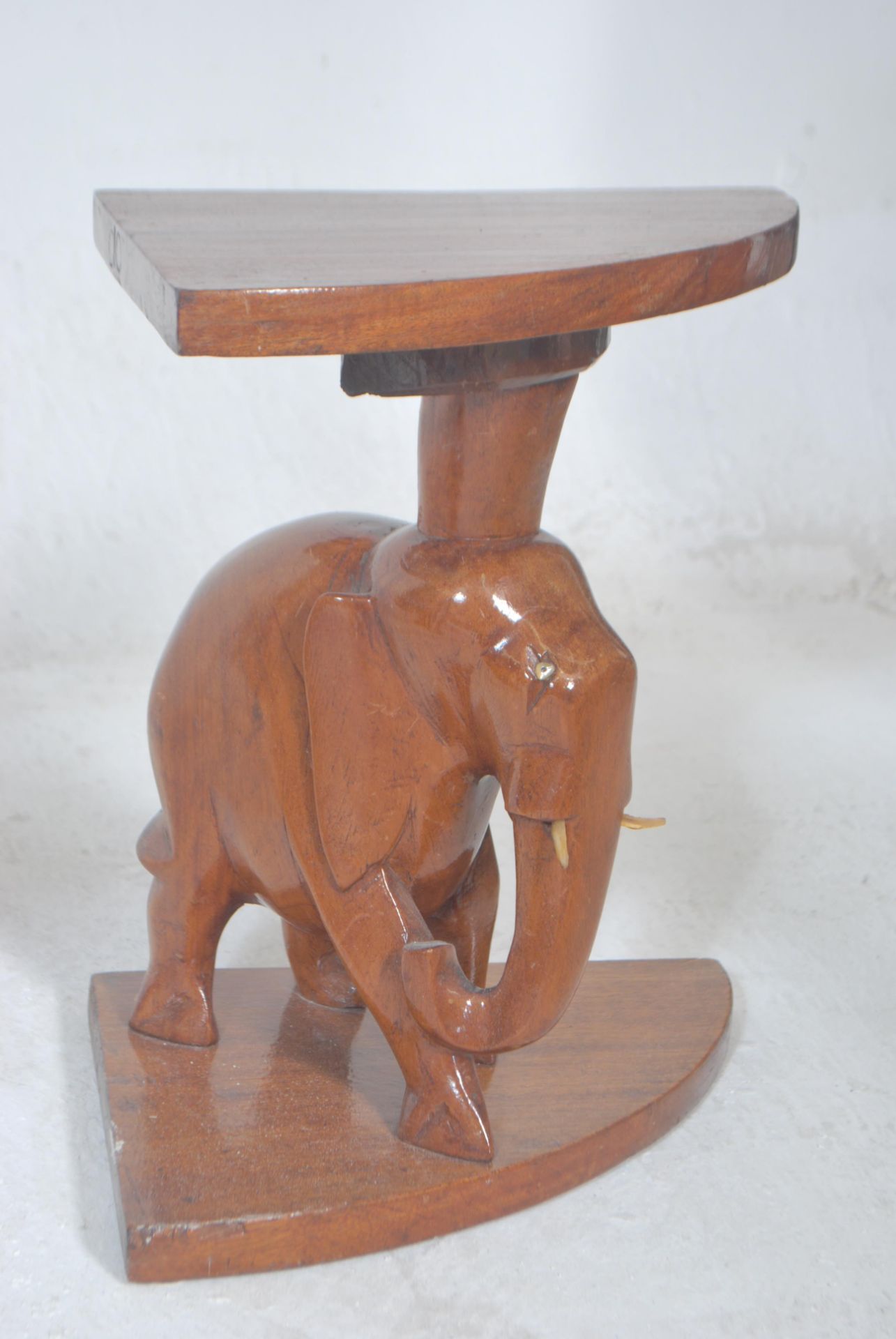 A vintage 20th Century African tribal carved wooden nest of tables having a carved top depicting a - Bild 7 aus 7